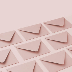 Soft pink envelopes symbolizing Hem’s thoughtful, personal customer support—because every message matters.