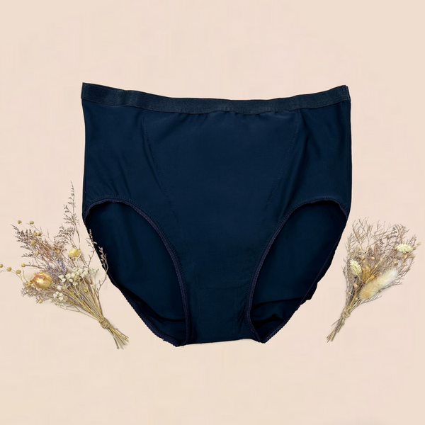 Underwear designed to help alleviate symptoms of pelvic organ prolapse and other pelvic floor conditions. Image shows flat lay of black high waisted underwear with targeted pelvic floor support.